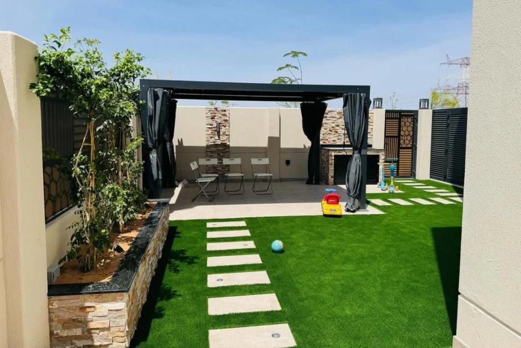 Pergola grass and tiles installation outdoor with alwardalandscaping