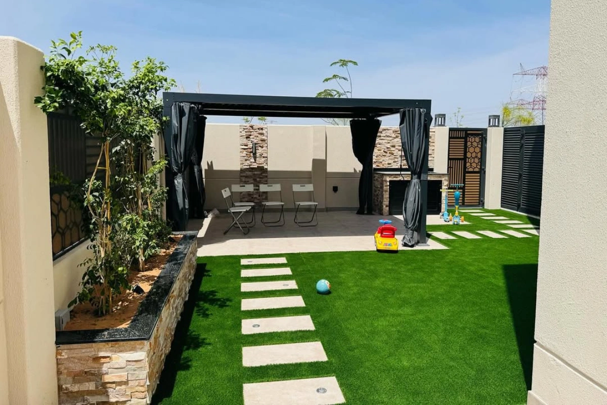Pergola_grass_and_tiles_installation_outdoor_with_alwardalandscaping