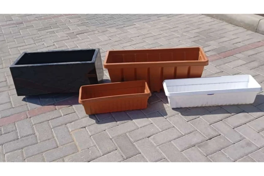 Built-in planter box installed along a Dubai garden boundary