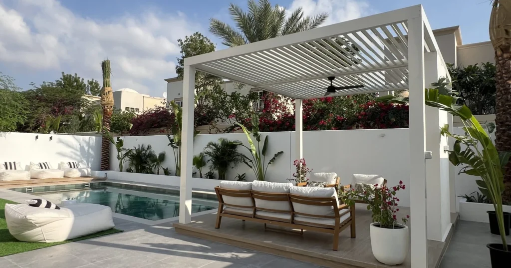 Garden landscaping with pergola sitting area